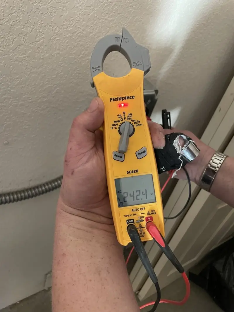Voltage testing with clamp meter during Generator Installation in Prineville